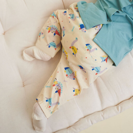 Katoen - Neushoorn sleutelt aan dino-2