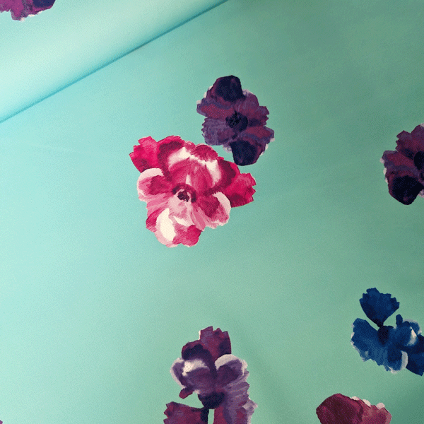Polyester - Lichtaqua met pioenroos