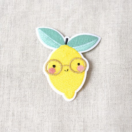 Applicatie - citroen met gouden bril