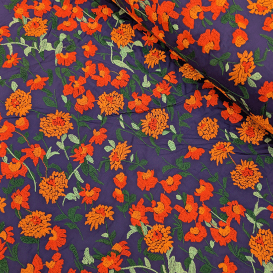 Katoen - Oranje bloemen op blauw