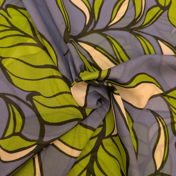 Voilekatoen - Grote bladeren op zachtblauw